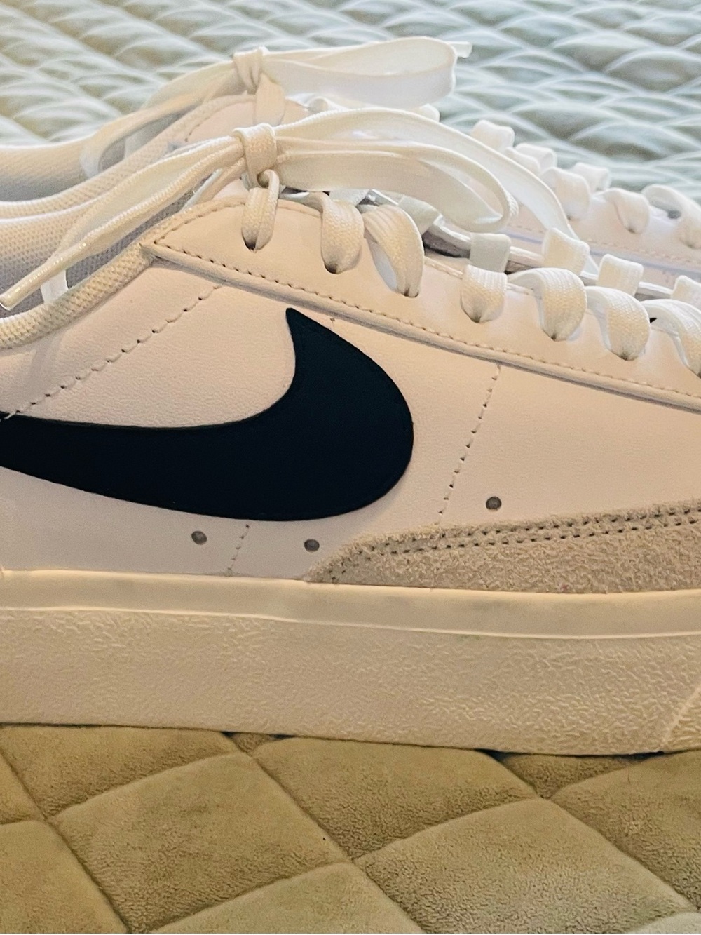 Nike Women’s White Leather Low-Top Sneakers with Black Swoosh